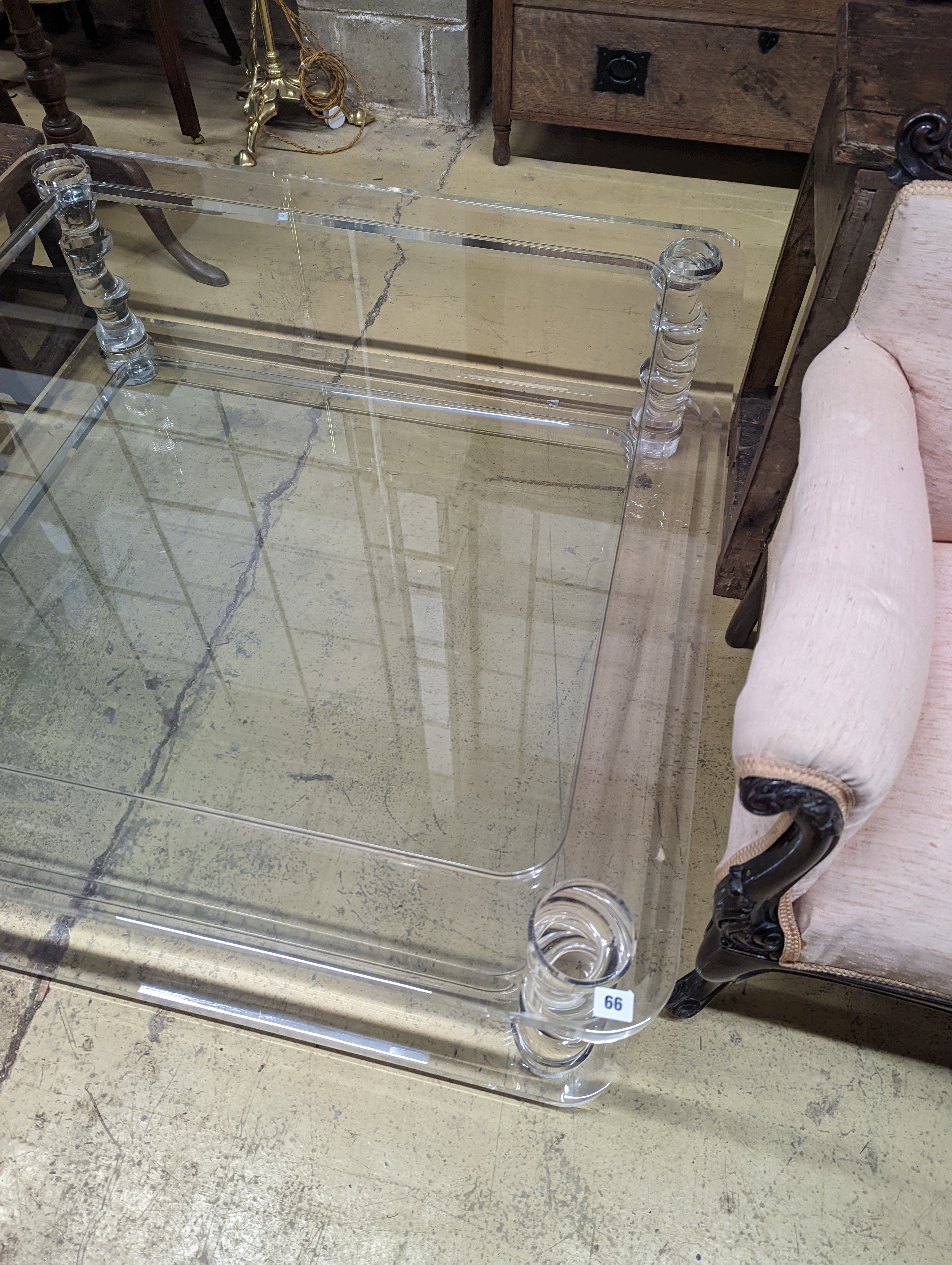 A contemporary perspex and glass square two tier coffee table, width 120cm, height 40cm